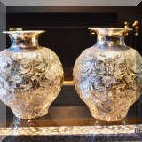 D27. Pair of silvertone vases. 